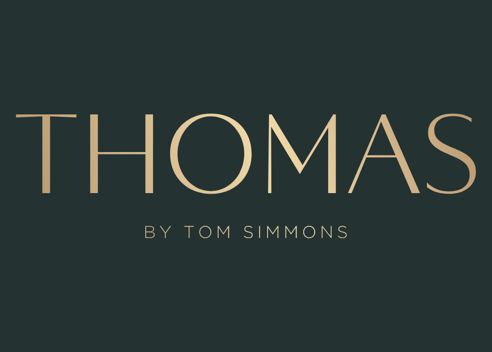 Logo for Thomas by Tom Simmons